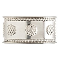 Accented with berry and thread motifs, this gleaming bright-satin-finished napkin ring from Juliska adds a polished look to special meals. Accented with berry and thread motifs, this gleaming bright-satin-finished napkin ring from Juliska adds a polished look to special meals.