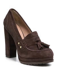 Prep up your look in these chocolate suede loafer pumps, sporting jaunty tasseled vamps on seriously sturdy heels. By VINCE CAMUTO. Prep up your look in these chocolate suede loafer pumps, sporting jaunty tasseled vamps on seriously sturdy heels. By VINCE CAMUTO.