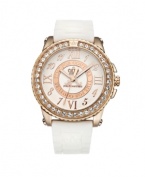 Pretty and polished. Show off your Pedigree with this watch by Juicy Couture. White synthetic jelly strap and round rose-gold plated stainless steel case. Bezel crystallized with Swarovski elements. Textured silver tone dial features applied Roman and Arabic numerals, ring reading Time for Couture, three hands and logo. Quartz movement. Water resistant to 30 meters. Two-year limited warranty.