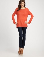 Snug alpaca and silk boatneck with dropped shoulders, lengthy silhouette and long dolman sleeves. BoatneckDropped shouldersLong dolman sleevesRibbed cuffs and hem70% alpaca/30% silkDry cleanImported of Italian fabric