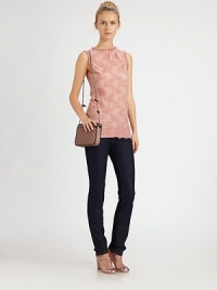 A modern take on a Victorian stand collar, this ladylike top is perfectly enhanced by delicate Italian lace.Stand collarSleevelessRuffle trimButton closure at keyhole backLace back tieAbout 27 from shoulder to hem75% viscose/25% polyamideDry cleanMade in Italy of imported fabric Model shown is 5'10½ (179cm) wearing US size 4. A modern take on a Victorian stand collar, this ladylike top is perfectly enhanced by delicate Italian lace.Stand collarSleevelessRuffle trimButton closure at keyhole backLace back tieAbout 27 from shoulder to hem75% viscose/25% polyamideDry cleanMade in Italy of imported fabric Model shown is 5'10½ (179cm) wearing US size 4.