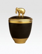 A candle with the intoxicating scent of pink champagne, encased in handcrafted, fine Limoges porcelain with 14k goldplated accents. Includes a fitted lid with a clasp sculpted in the shape of an elephant on an island of 14k gold. Handcrafted porcelain 5½H X 5 diam. Imported 