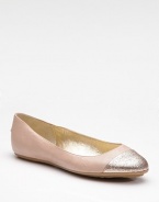 Classic ballerina styling in fine leather sparked with a glittery toe cap. Rubber heel, ½ (15mm) Leather upper Metal logo plate at heel Leather lining Padded insole Rubber sole Made in ItalyOUR FIT MODEL RECOMMENDS ordering one size up as this style runs small. 