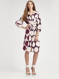 Vibrant circle print pop on sumptuous matte jersey in an effortless button-down shift.Point collarButton-down frontDropped shouldersThree-quarter bell sleevesChest pocketSelf-beltShirttail hemAbout 22 from natural waist95% silk/5% LycraDry cleanImportedModel shown is 5'10 (177cm) wearing US size 4.OUR FIT MODEL RECOMMENDS ordering true size. Vibrant circle print pop on sumptuous matte jersey in an effortless button-down shift.Point collarButton-down frontDropped shouldersThree-quarter bell sleevesChest pocketSelf-beltShirttail hemAbout 22 from natural waist95% silk/5% LycraDry cleanImportedModel shown is 5'10 (177cm) wearing US size 4.OUR FIT MODEL RECOMMENDS ordering true size.