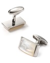 Sharpen your professional attire with these handsome cufflinks, featuring a subtly iridescent white stone on shiny palladium for unique polish.