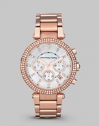 This warm rose gold timepiece shines with a crystal bezel. Quartz movement Water resistant to 5 ATM Round rose goldplated stainless steel case, 39mm (1.5) Crystal bezel Mother-of-pearl dial Arabic numeral and bar hour markers Second hand Rose goldplated stainless steel link bracelet Imported 