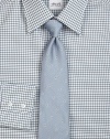 A sartorial standard in a beautifully crafted woven neat silk pattern.SilkDry cleanMade in Italy