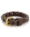 This braided leather bracelet is offset by a gold metal buckle for a classic masculine look.