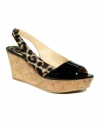 Rock the look. These Circa by Joan & David's Wictoria flatform sandals give rise to leopard designs with a 3 cork wedge.