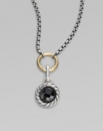 A richly faceted black onyx in a graceful cable frame makes an elegant addition to your own necklace or bracelet. Black onyx Sterling silver Diameter, about ½ Spring clip clasp Made in USA Please note: Necklace sold separately.