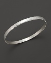 This textured silver bracelet makes a subtle, sophisticated statement.