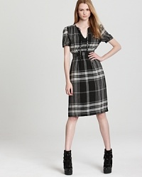 Preppy meets punk as a tonal palette imbues this checked Burberry Brit dress with modern edge. Just add chunky boots and you've got the perfect boy-meets-girl mix. Preppy meets punk as a tonal palette imbues this checked Burberry Brit dress with modern edge. Just add chunky boots and you've got the perfect boy-meets-girl mix.
