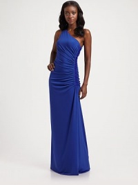Sleek one-shoulder design in classic matte jersey knit with beaded trim along the side.Asymmetrical neckline One shoulder strap Ruched side with beaded trim Side slit Side zip closure Fully lined About 44½ from natural waist 95% polyester/5% spandex Dry clean ImportedModel shown is 5'10½ (179cm) wearing US size 4. Sleek one-shoulder design in classic matte jersey knit with beaded trim along the side.Asymmetrical neckline One shoulder strap Ruched side with beaded trim Side slit Side zip closure Fully lined About 44½ from natural waist 95% polyester/5% spandex Dry clean ImportedModel shown is 5'10½ (179cm) wearing US size 4.