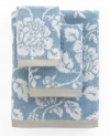 Sweet serenity. Offering a romantic and elegant composition for your bath space, this Aquarelle hand towel features pretty blooms in soft blue hues.