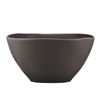 Featuring an organic shape and a matte glaze finish, this bowl is thoroughly modern and imparts natural sophistication.