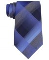 Polished plaid adds sophistication to this Kenneth Cole Reaction statement piece.