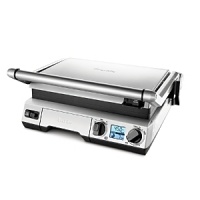 Indoor grilling with outdoor taste. The Breville Smart Grill's Element IQ technology features an 1800-watt embedded heating design, which ensures maximum heat into the plates for faster cooking and reduced preheating time. This creates a BBQ-quality sear and sizzle. The flat bottom plate is suitable for eggs and pancakes while the top plate is ribbed to sear meats. Plate positions are interchangeable and can be extended into an opened, flat 'BBQ Mode.' Indoor grilling with outdoor taste. The Breville Smart Grill's Element IQ technology features an 1800-watt embedded heating design, which ensures maximum heat into the plates for faster cooking and reduced preheating time. This creates a BBQ-quality sear and sizzle. The flat bottom plate is suitable for eggs and pancakes while the top plate is ribbed to sear meats. Plate positions are interchangeable and can be extended into an opened, flat 'BBQ Mode.'
