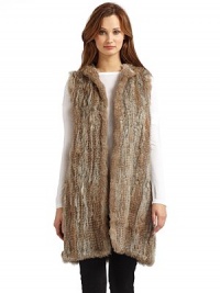 THE LOOKOpen front necklineFur hoodSleevelessTHE FITAbout 34 from shoulder to hemTHE MATERIALGenuine rabbit furCARE & ORIGINDry clean by fur specialistImportedFur origin: China THE LOOKOpen front necklineFur hoodSleevelessTHE FITAbout 34 from shoulder to hemTHE MATERIALGenuine rabbit furCARE & ORIGINDry clean by fur specialistImportedFur origin: China