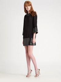 A retro-inspired dress with sequined detailing at the neck, cuff and hem.Crewneck Three-quarter sleeves Sequined neck, cuff and hem About 33¾ from shoulder to hem Back zip closure Fully lined Viscose; hand wash Imported Additional Information Women's Premier Designer & Contemporary Size Guide A retro-inspired dress with sequined detailing at the neck, cuff and hem.Crewneck Three-quarter sleeves Sequined neck, cuff and hem About 33¾ from shoulder to hem Back zip closure Fully lined Viscose; hand wash Imported Additional Information Women's Premier Designer & Contemporary Size Guide