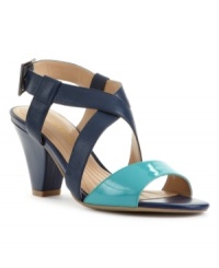 Go graphic with the modern color blocking of the Raince sandals by Easy Spirit. The brand's signature comfort features combine with a stacked wedged heel for a look that's oh-so-right this season. Go graphic with the modern color blocking of the Raince sandals by Easy Spirit. The brand's signature comfort features combine with a stacked wedged heel for a look that's oh-so-right this season.