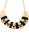 A daring style takes shape in this frontal necklace from Haskell. Crafted from gold-tone mixed metal with black and gold-tone geometric segments, the necklace makes a bold statement. Approximate length: 13 inches + 3-inch extender. Approximate drop: 1-1/2 inches.