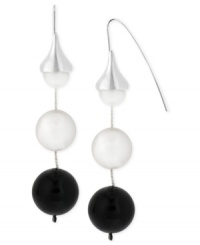Black and white and stylish all over, this pair of drop earrings from Robert Lee Morris bolsters the basics with a fancy silhouette. The earrings are crafted from silver-tone mixed metal with simulated pearl and black beaded accents. Approximate drop: 2-1/2 inches. Black and white and stylish all over, this pair of drop earrings from Robert Lee Morris bolsters the basics with a fancy silhouette. The earrings are crafted from silver-tone mixed metal with simulated pearl and black beaded accents. Approximate drop: 2-1/2 inches.