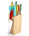 Take a tint! Martha Stewart packs personality and professional performance into your space yet again with this colored cutlery set. Set in a range of retro hues, each chef's essentials features a comfort soft grip, ergonomic handle and precision blade. Lifetime warranty.