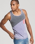 Rethink your tank. ALTERNATIVE offers up this diagonal color block tank top with contrast trim and a weathered, vintage look and feel.