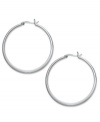 Take your look up a notch with simply stunning hoops. Touch of Silver's thin, polished design is crafted in silver-plated brass with a sterling silver click backing. Approximate diameter: 1-5/8 inches.