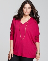 This refined knit basic by Eileen Fisher flatters in pure wool, styled in a long boxy silhouette that exudes effortless chic. This refined knit basic by Eileen Fisher flatters in pure wool, styled in a long boxy silhouette that exudes effortless chic.