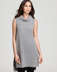 A chic cowlneck and high/low hem infuse a sleeveless Eileen Fisher sweater with modern inspiration. Slip it on for instant statement style. A chic cowlneck and high/low hem infuse a sleeveless Eileen Fisher sweater with modern inspiration. Slip it on for instant statement style.