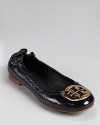 In pebbled patent, Tory Burch's Reva flat looks fresh in navy blue.