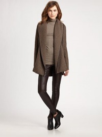 Rich jacuard in a warming blend of wool, alpaca, yak and cashmere, styled with a classic shawl collar and sleek leather trim.Deep shawl collarLong sleevesOpen frontLeather trimAbout 24 from shoulder to hem45% wool/25% alpaca/25% yak/5% cashmereDry cleanImportedModel shown is 5'11 (180cm) wearing US size 2. Rich jacuard in a warming blend of wool, alpaca, yak and cashmere, styled with a classic shawl collar and sleek leather trim.Deep shawl collarLong sleevesOpen frontLeather trimAbout 24 from shoulder to hem45% wool/25% alpaca/25% yak/5% cashmereDry cleanImportedModel shown is 5'11 (180cm) wearing US size 2.