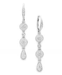 Dramatic and dazzling. Eliot Danori's sparkling earrings style features round and pear-shaped drops encrusted with pave-set crystals. Set in silver tone mixed metal. Approximate drop: 1-1/2 inches. Dramatic and dazzling. Eliot Danori's sparkling earrings style features round and pear-shaped drops encrusted with pave-set crystals. Set in silver tone mixed metal. Approximate drop: 1-1/2 inches.