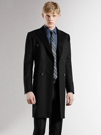 A classic wool topcoat features a double-breasted front and signature GG lining. Double-breasted buttonfront Three waist flap pockets Signatur elining About 34½ from shoulder to hem Wool Dry clean Made in Italy A classic wool topcoat features a double-breasted front and signature GG lining. Double-breasted buttonfront Three waist flap pockets Signatur elining About 34½ from shoulder to hem Wool Dry clean Made in Italy