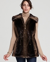 Add a luxe top layer to your look with this sumptuous faux fur anorak vest from Ellen Tracy. Add a luxe top layer to your look with this sumptuous faux fur anorak vest from Ellen Tracy.
