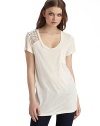 The classic pocket tee gets a glamorous update with a chiffon inset on one shoulder, embellished with chunky beads and chains.Scoopneck Single embellished shoulder Pullover style Short sleeves Chest welt pocket About 26¾ from shoulder to hem Rayon; hand wash Imported