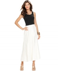 A full maxi silhouette rendered from breezy linen lends a beach-inspired touch to this Ellen Tracy skirt. A full maxi silhouette rendered from breezy linen lends a beach-inspired touch to this Ellen Tracy skirt.
