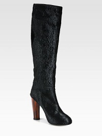 An ultra-seductive silhouette rendered in lush pony hair with a towering wooden heel. Wooden heel, 4½ (115mm)Hidden platform, ¾ (20mm)Compares to a 3¾ heel (95mm)Shaft, 16Leg circumference, 13Pony hair upperPull-on styleLeather lining and solePadded insoleMade in Italy An ultra-seductive silhouette rendered in lush pony hair with a towering wooden heel. Wooden heel, 4½ (115mm)Hidden platform, ¾ (20mm)Compares to a 3¾ heel (95mm)Shaft, 16Leg circumference, 13Pony hair upperPull-on styleLeather lining and solePadded insoleMade in Italy