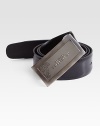 Stamped Italian leather with signature logo buckle.Patent leatherAbout 1 wideMade in Italy