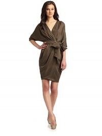 THE LOOKSurplice V necklinePleats at shouldersDolman sleevesConcealed skinny ties at side waistWaist sash ties into a bowDraped skirtTHE FITAbout 39 from shoulder to hemTHE MATERIAL64% Bemburg cupro/36% TencelCARE & ORIGINHand wash or dry cleanImportedModel shown is 5'10½ (179cm) wearing US size 4. THE LOOKSurplice V necklinePleats at shouldersDolman sleevesConcealed skinny ties at side waistWaist sash ties into a bowDraped skirtTHE FITAbout 39 from shoulder to hemTHE MATERIAL64% Bemburg cupro/36% TencelCARE & ORIGINHand wash or dry cleanImportedModel shown is 5'10½ (179cm) wearing US size 4.