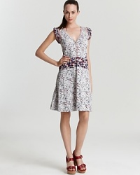 Delight in this MARC BY MARC JACOBS cotton dress featuring mixed floral prints, flutter sleeves and a demure flare skirt. Nipped at the waist, the silhouette flaunts your trim figure and soft sense of style. Delight in this MARC BY MARC JACOBS cotton dress featuring mixed floral prints, flutter sleeves and a demure flare skirt. Nipped at the waist, the silhouette flaunts your trim figure and soft sense of style.