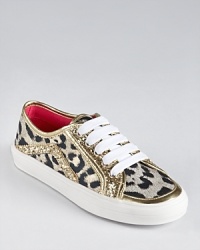 High-energy shoes for your wild child, these lace-up sneakers feature a leopard print, gold metallic trim and contrast red interior. High-energy shoes for your wild child, these lace-up sneakers feature a leopard print, gold metallic trim and contrast red interior.