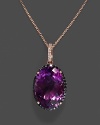 Amethyst pendant necklace with black and white diamonds in rose gold.