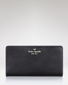 kate spade new york's leather wallet is a city-sleek purse companion. Slip it inside a structured tote to keep the urban essentials at an arm's length.