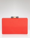 Perfect the hand-off with this clutch from kate spade new york. Boxy and bold, it has just the right amount of ladylike glamor, thanks to it's glossy hue and bow detailing.