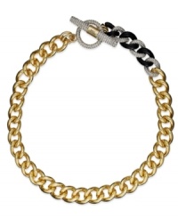 Extra elegance. This chunky collar necklace from Juicy Couture takes an unexpected turn with black epoxy and glistening pave crystals. Crafted in gold tone brass with toggle clasp. Approximate length: 18 inches. Extra elegance. This chunky collar necklace from Juicy Couture takes an unexpected turn with black epoxy and glistening pave crystals. Crafted in gold tone brass with toggle clasp. Approximate length: 18 inches.