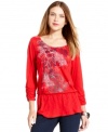 Style&co. makes this printed top vibrant with bold color, studded detail and a fun drop-waist silhouette.