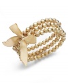 Golden opportunity. A sandblast technique adds textured detailing to this stylish trio of gold tone mixed metal stretch bracelets from Charter Club. Adorned with an array of beads, the stretch design makes them comfortable and easy to wear. Approximate diameter: 2 inches.