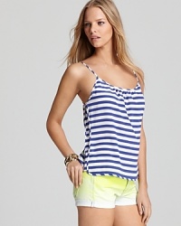 The classic Juicy Couture tank gets an elegant new attitude with crisp nautical stripes. A relaxed cut pairs with a ruched neckline for a modern feel. The classic Juicy Couture tank gets an elegant new attitude with crisp nautical stripes. A relaxed cut pairs with a ruched neckline for a modern feel.